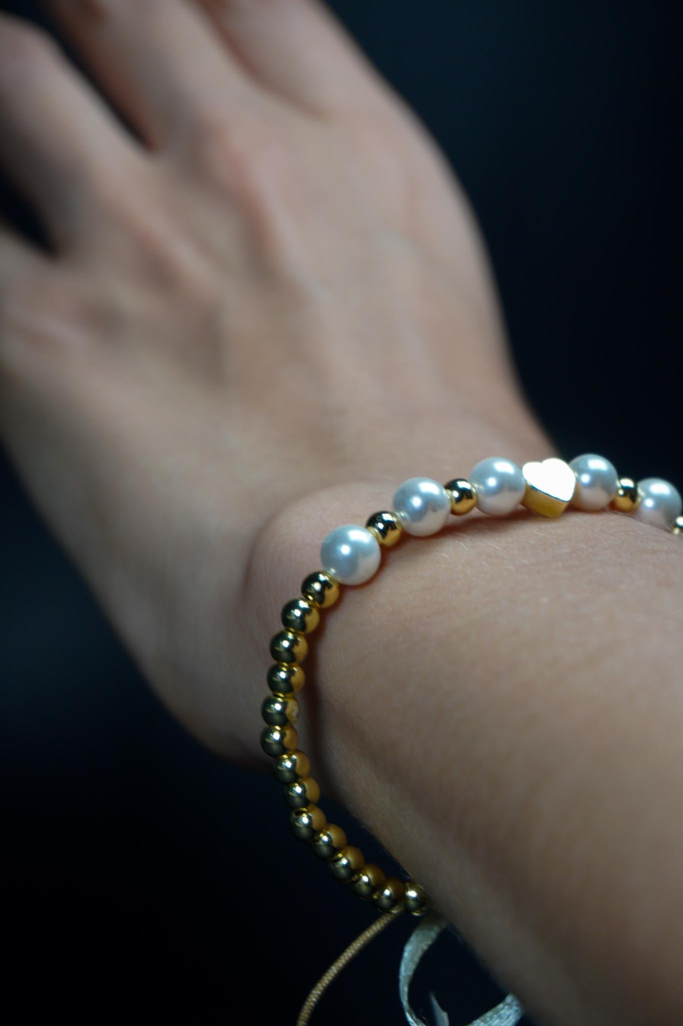 Pulsera en perlas con corazón